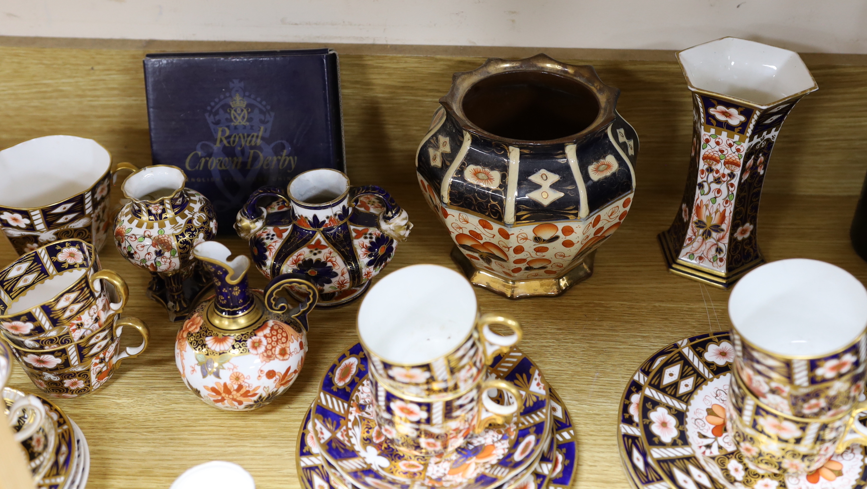 Royal Crown Derby and other Imari pattern tea ware including vases, sandwich plates and trios, several areas of damage